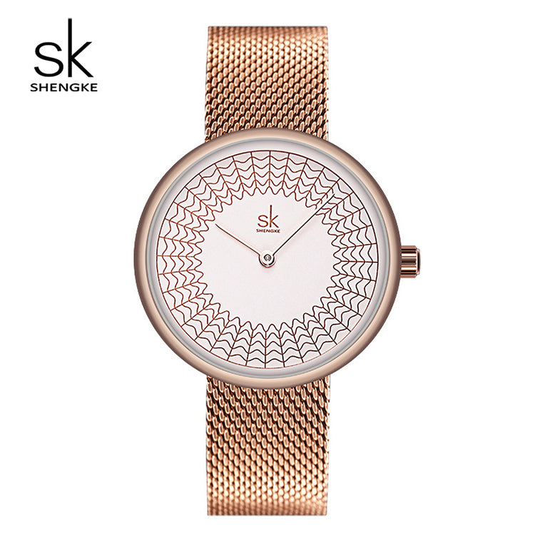 Montre femme finition doré rose MB-SH-FEM-019 — cadran clair à motif géométrique et bracelet en maille dorée rose