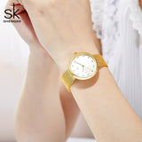 Montre femme finition dorée MB-SH-FEM-020 — portée au poignet